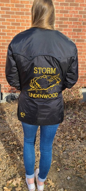 Gold Logo on Back of Coat